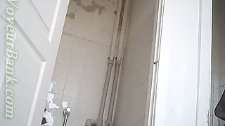 Chunky white brunette lady texting and pissing in the toilet