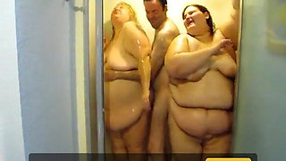 2BBWs and 2 guys in one showeroh what wet fun