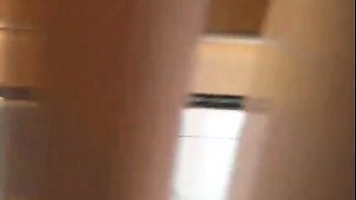 BBW Brunette with Big Tits Poses in the Kitchen