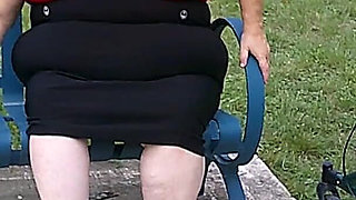 Nurse Vicki Smoking in the Park on a Bench All Dressed up