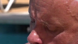 Colored hair babe is pleasing a hard cock with her feet