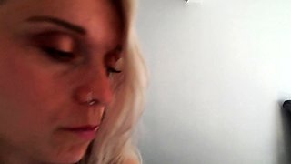 A super sexy blonde with big boobs and masturbating with a v