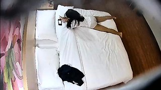 Cute amateur asian web cam girl playing with her toy