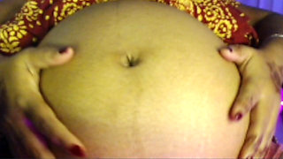 Pregnent Lady Playing Big Belly Short.