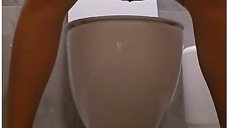 Public Toilet Pissing In Tights And Beautiful Dress