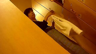 Cute amateur asian web cam girl playing with her toy