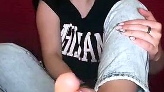Cute teen girl enjoys foot fetish