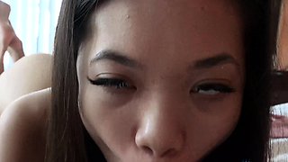 Amateur Asian teen gives blowjob outdoors