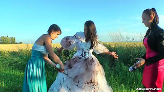 Girls cover the pretty bride in dirty mud and strip her