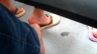 Real hidden footsie with dame in bus she enjoys