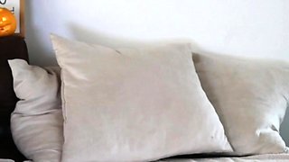 Busty curly brunette with big boobs fucks on couch
