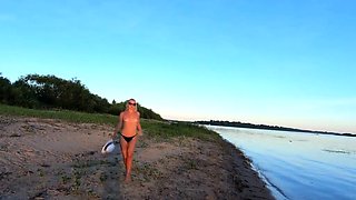 Russian Nudist on the River Shore
