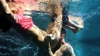 Brunette gives mass blowjob outdoors