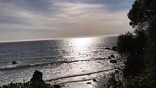 Model blows photographer on the beach and swallows cum
