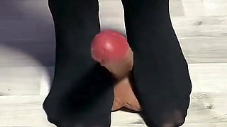 Sexy Dominatrix in Nylon Pantyhose Is Trampling Your Cock