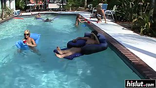 Lovely girls relax in the pool