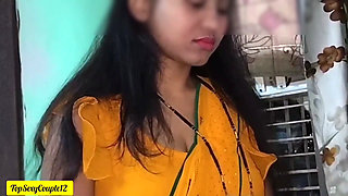 Desi Indian bhabhi in yellow saree looking hot and sexy