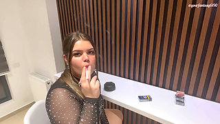 Shy girl smokes in front of you