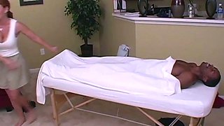 Fat black slut giving an interracial handjob