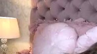 Brunette seductress working her big boobs and hot ass