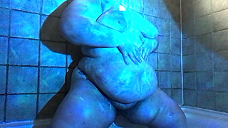 Blue Light Glistening Fat Tits