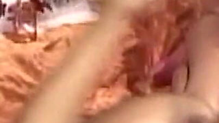 Young Lipstick Lesbians Share a Thick Red Dildo