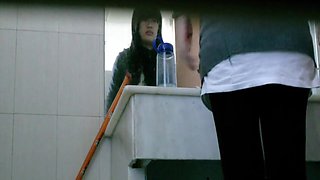 Hot video of an Asian chick pissing in the public toilet