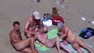 Cuckold couple on the beach