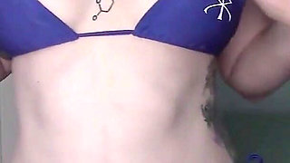 Tattooed Redhead Bikini Tease