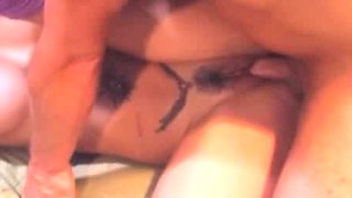 A super sexy brunette massages her big boobs