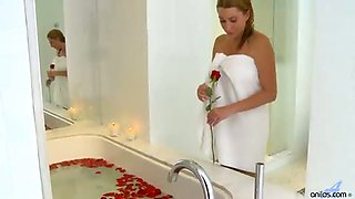 Sexy blonde mom seduces herself in a rose petal bath and