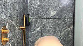 Latex Cow Undressing Under the Shower