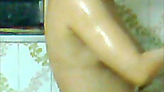 Wife in the bathroom washing her beautiful strong torso