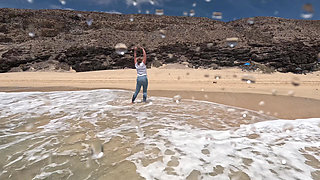 Girl Wetting Jeans in the Ocean and Swimming in Wet White T-shirt