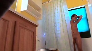 Stepdaughter 21 shaves pussy in shower (voyeur)