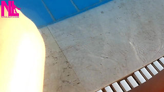 Barefoot Dangling in Swimming Pool Water