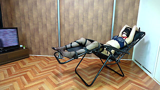 A Woman Is Restrained and Teased with Erotic Lotion