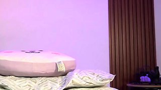 Cool brunette in stockings jerking her hard cock