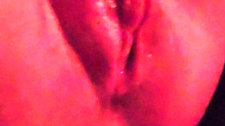 Muscular milf jerks off her big clit and pumps juice from horniness