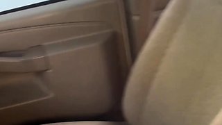 A super sexy brunette massages her big boobs