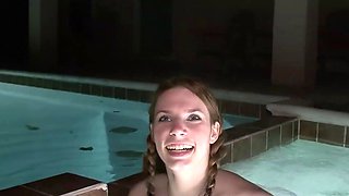 Brunette is outdoors and touching herself